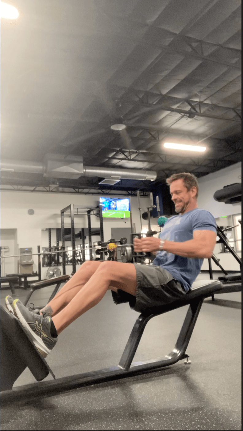 Michael Cavett doing a cable pull exercise