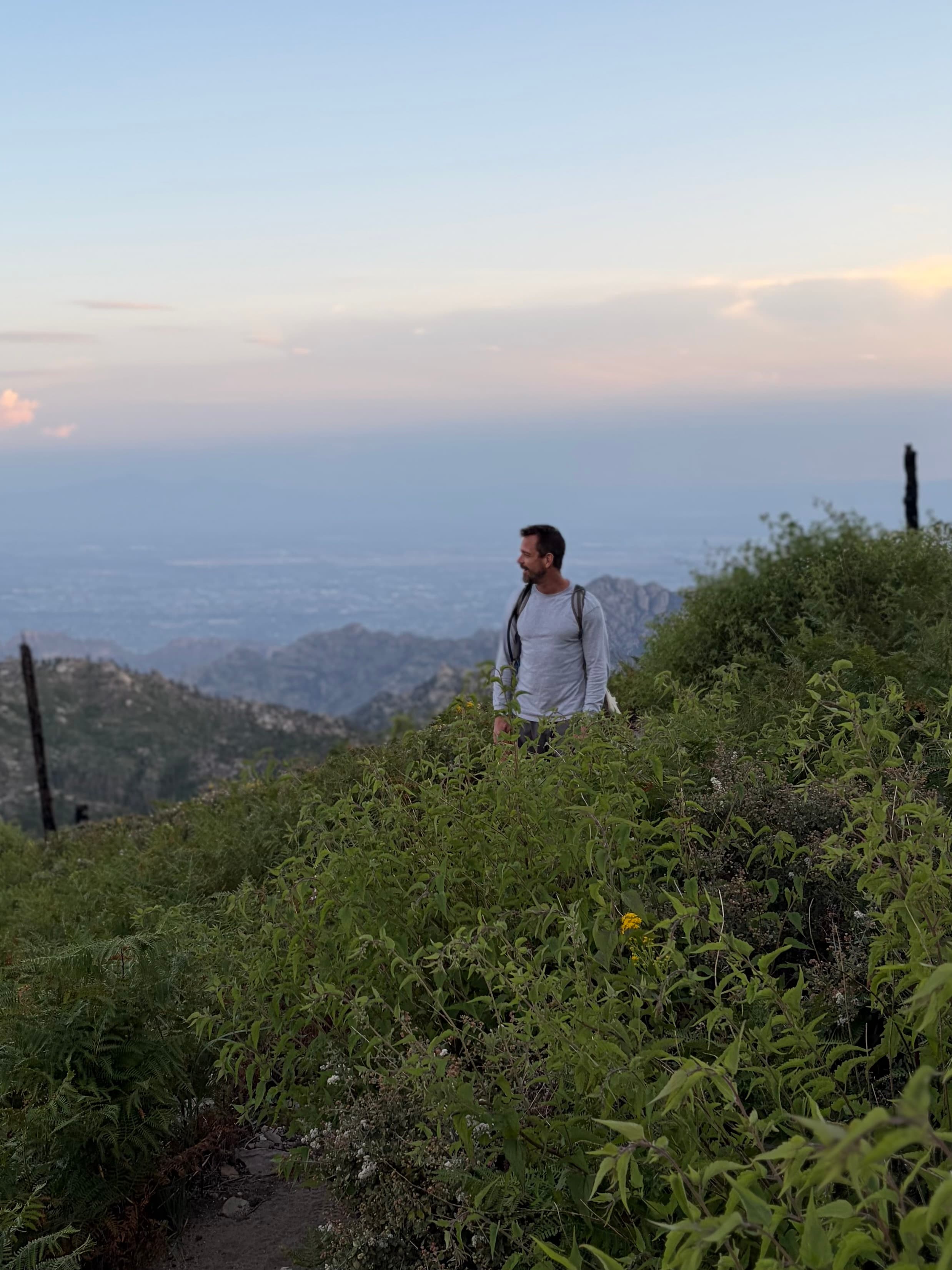 Michael Cavett hiking, side view